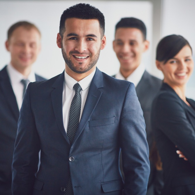 confident-business-team-with-leader (1)